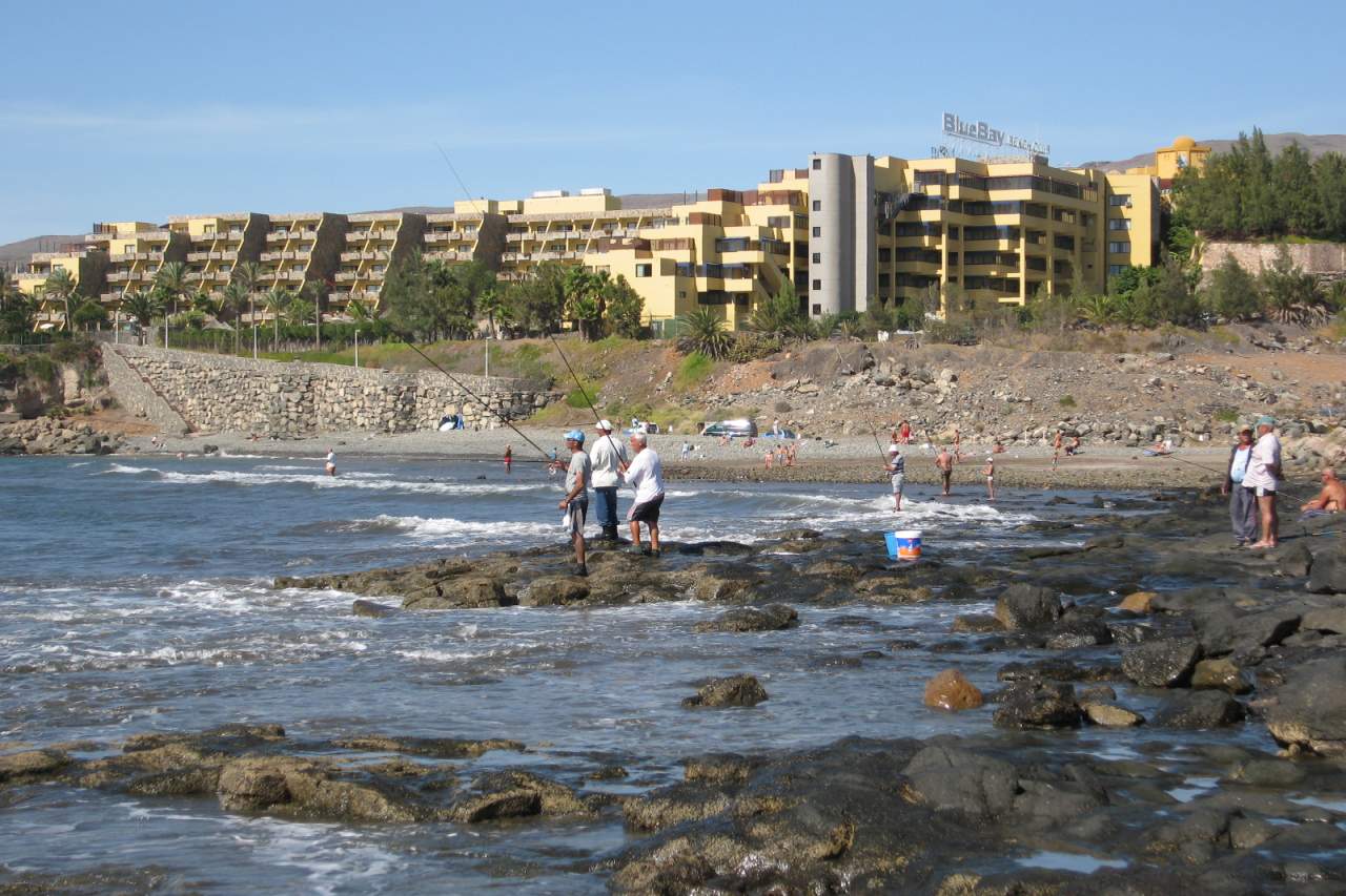 Bahia Feliz Angler am Strand