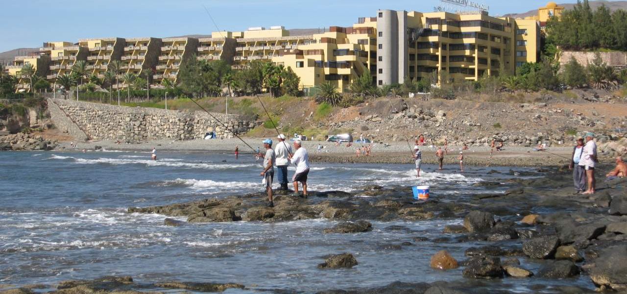 Bahia Feliz Angler am Strand